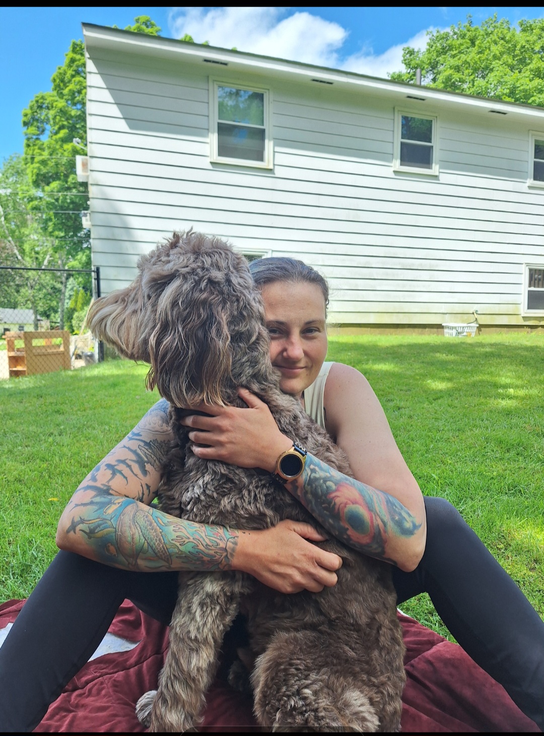 Stacie Shackett-Vance with a dog, pet care expert in Keene, NH